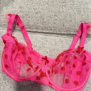 Vibrant Pink Lace Bra with Red Accents